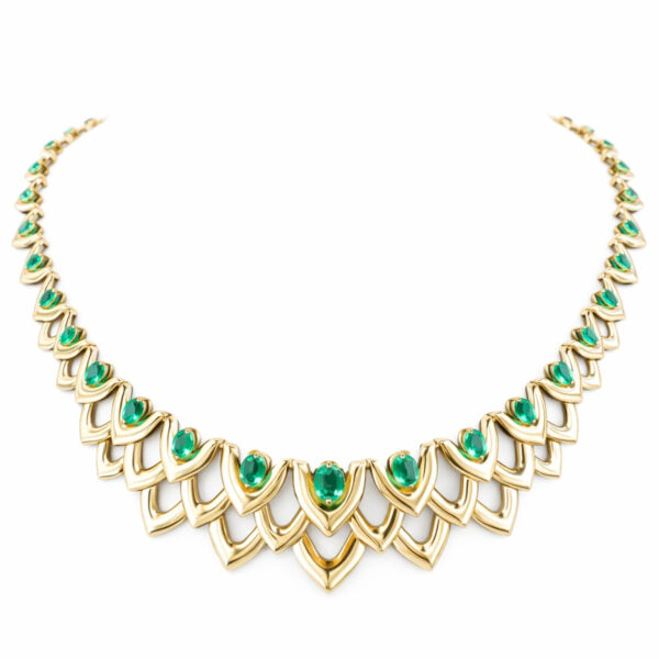 18K yellow gold parrot necklace adorned with 8.48 ct emeralds from the Pirates of St. Bart collection by Jordana Gheler