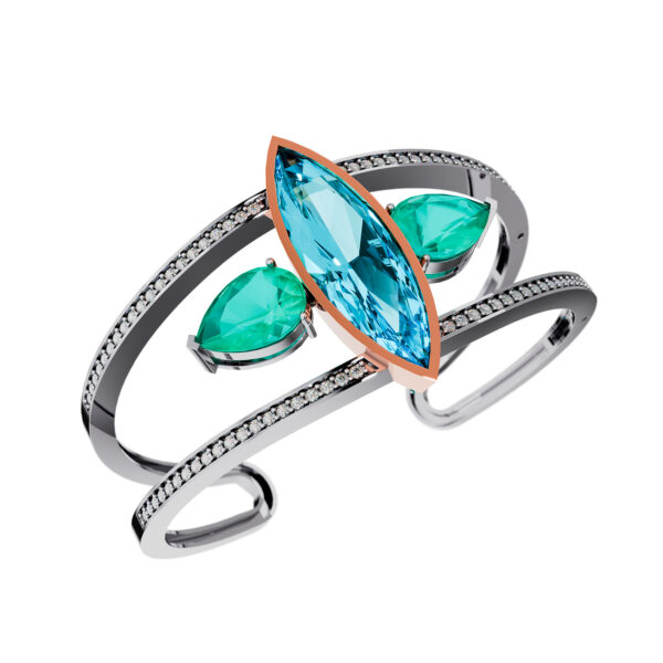 Open 18k white gold cuff bracelet with marquise sky topaz center, pear emeralds, and diamond pavé accents