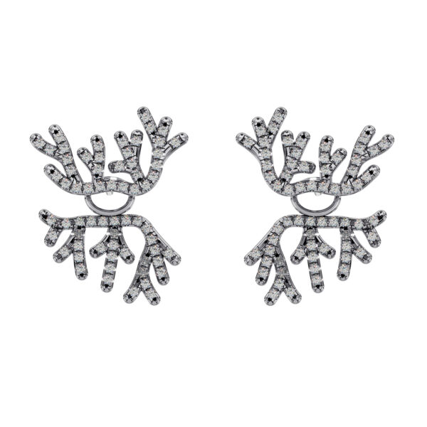 Pair of 18k white gold coral-branch earrings with diamond accents on a light studio background