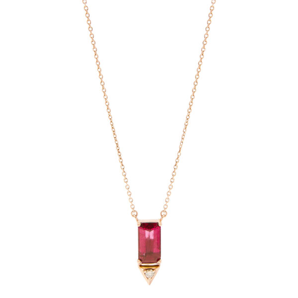 18k rose gold necklace with a rectangular pink rubellite pendant and small brown diamond accents