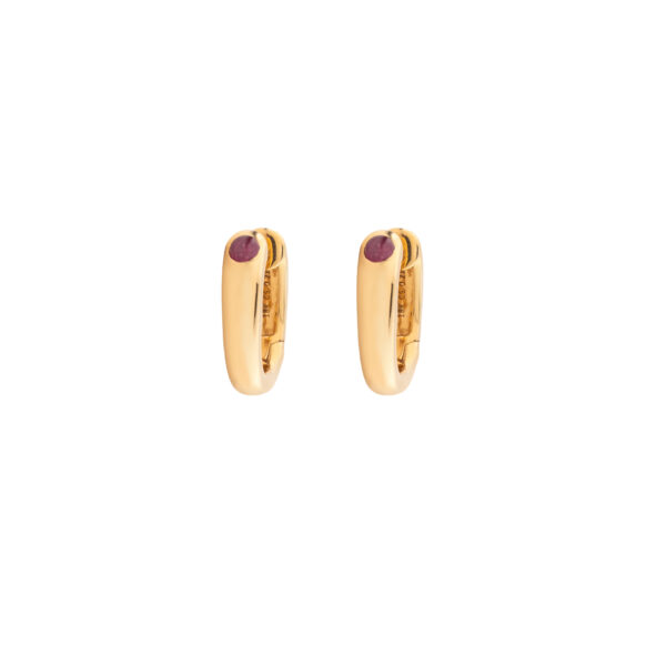 Pair of 18k yellow gold hoop earrings with diamonds, rough diamonds, and a small purple accent at the top on a white background